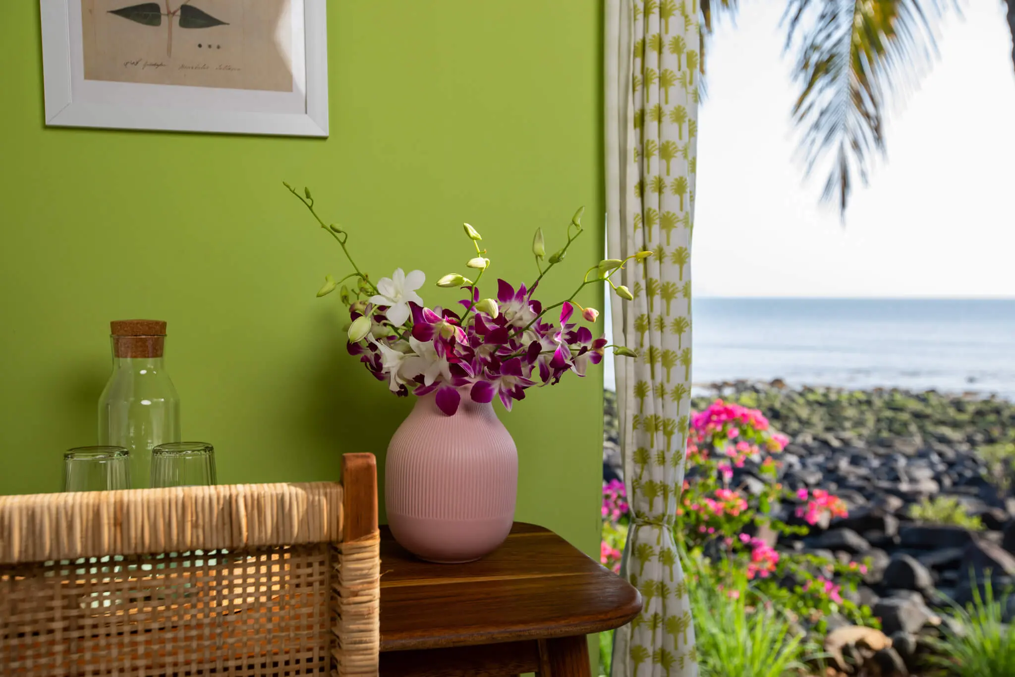 Sea View Hut 7 at Casa Jaali — orchids by the sea window