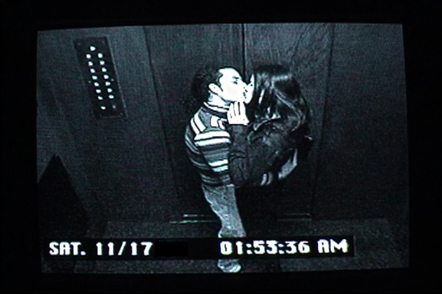 Elevator Moods — surveillance-camera still