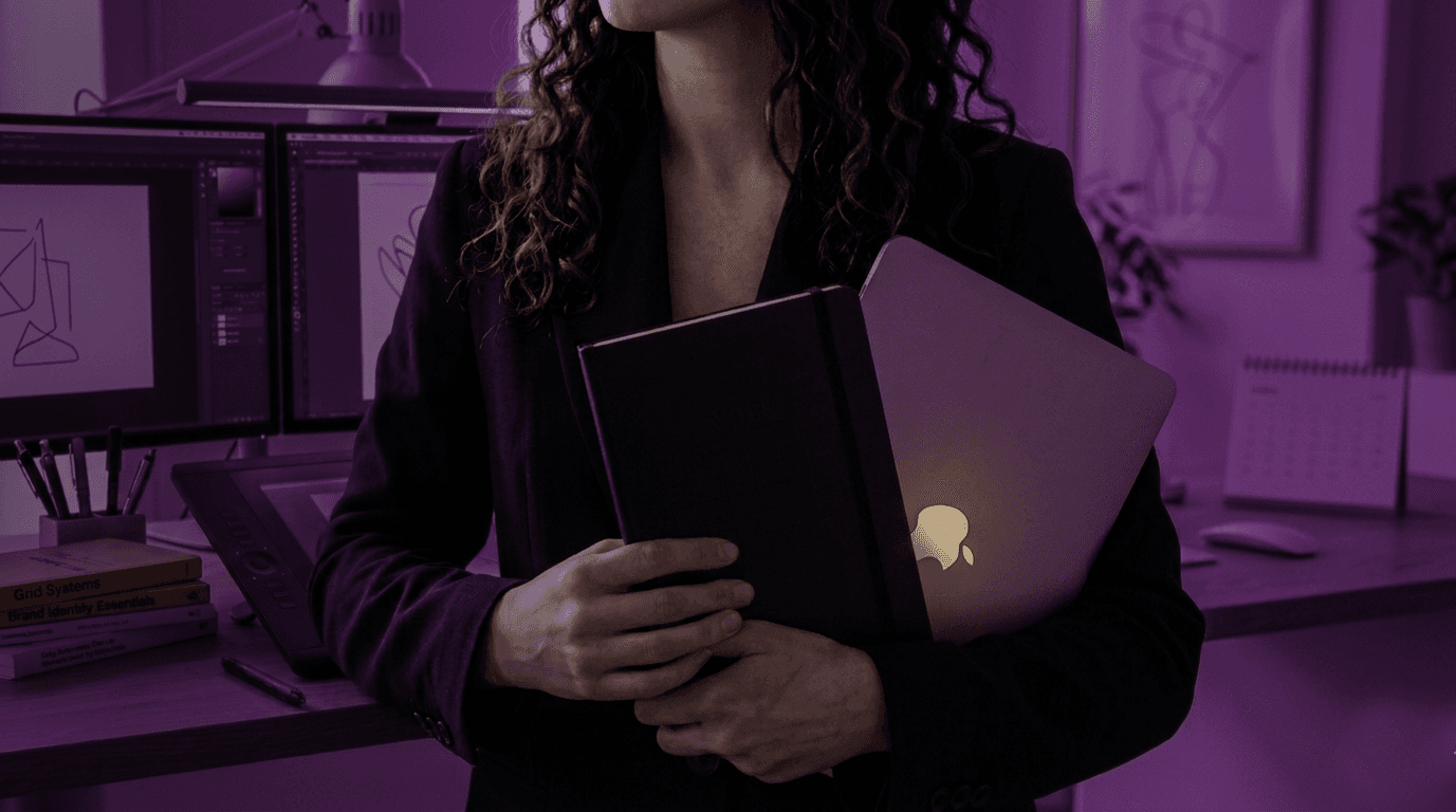 Woman holding apple laptop