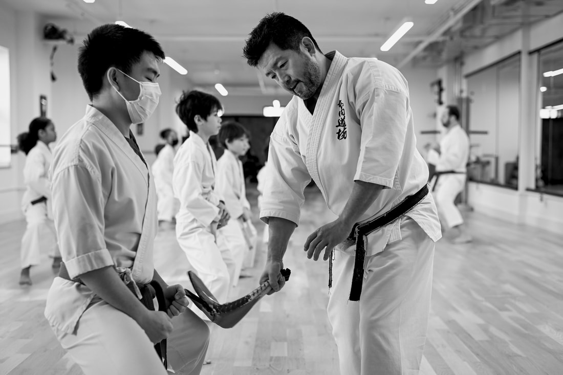 Coach explaining something to an athlete