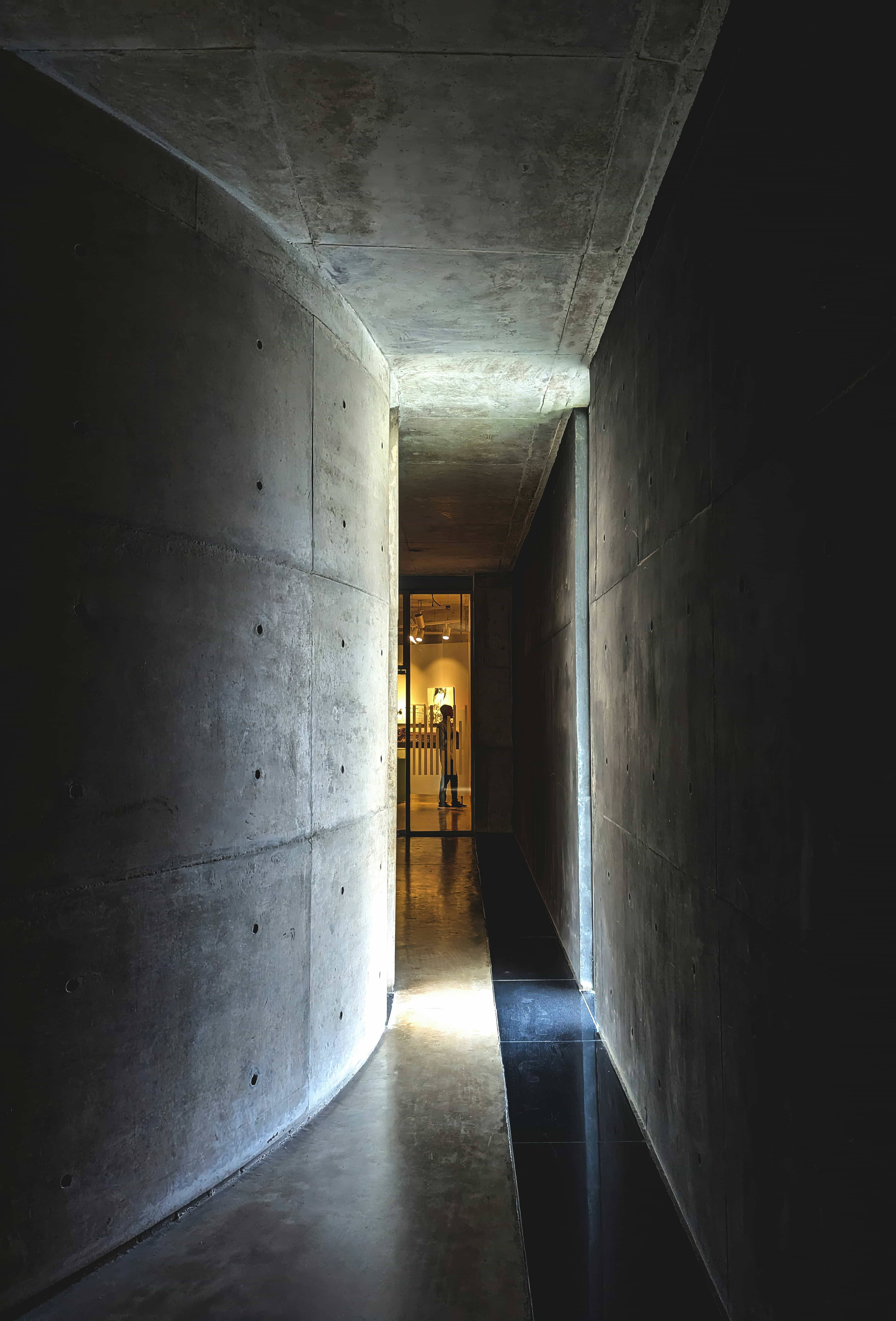 Concrete staircase with dramatic side lighting, shot in architectural black and white