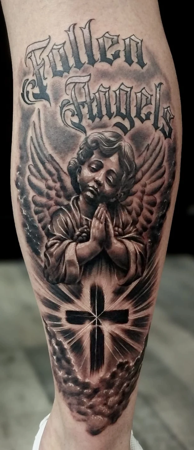 Angel and cross calf tattoo by Tomski