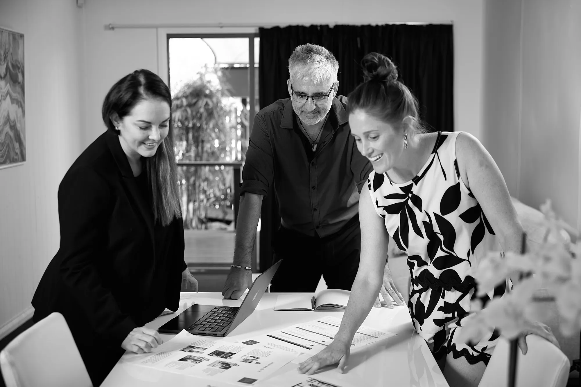 Business team meeting image for a professional services website focused on local Cairns organisations.