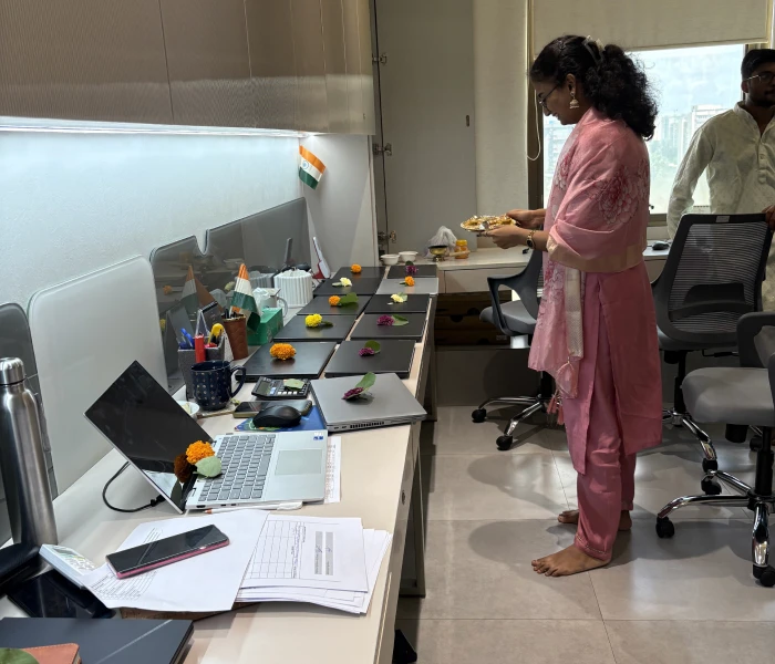 The image is from Instalogic, business intelligence, capturing employees celebrating together.