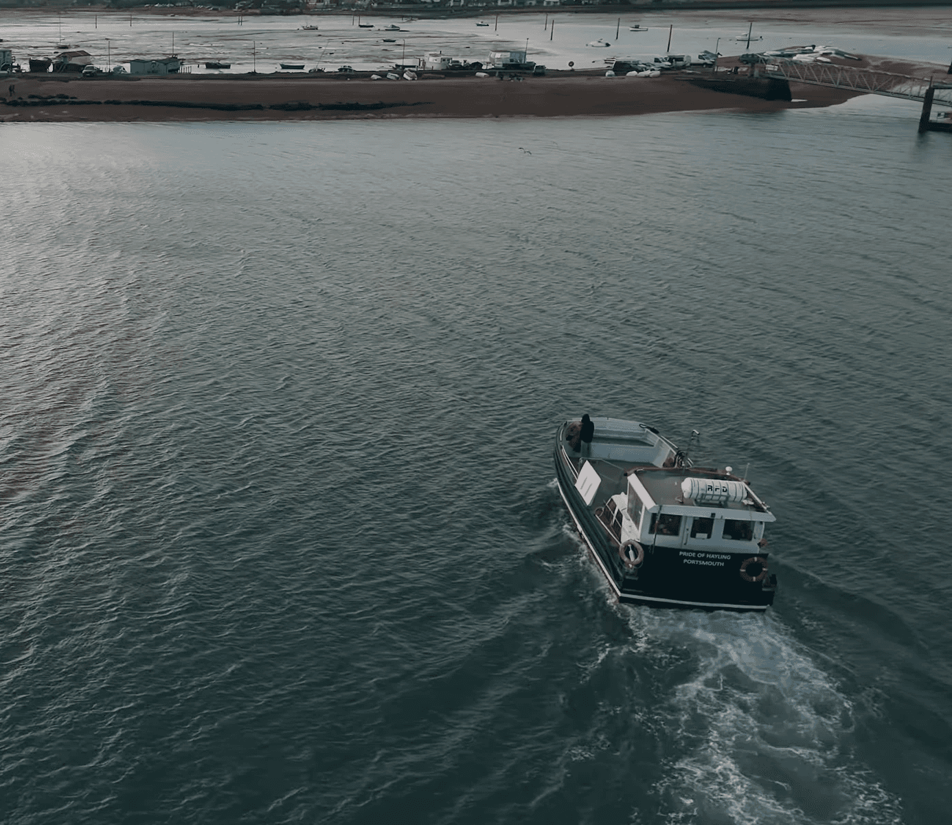 husband and wife working happily on a laptop