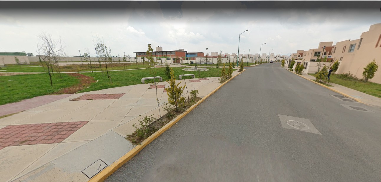 Drone shot of a running track at night