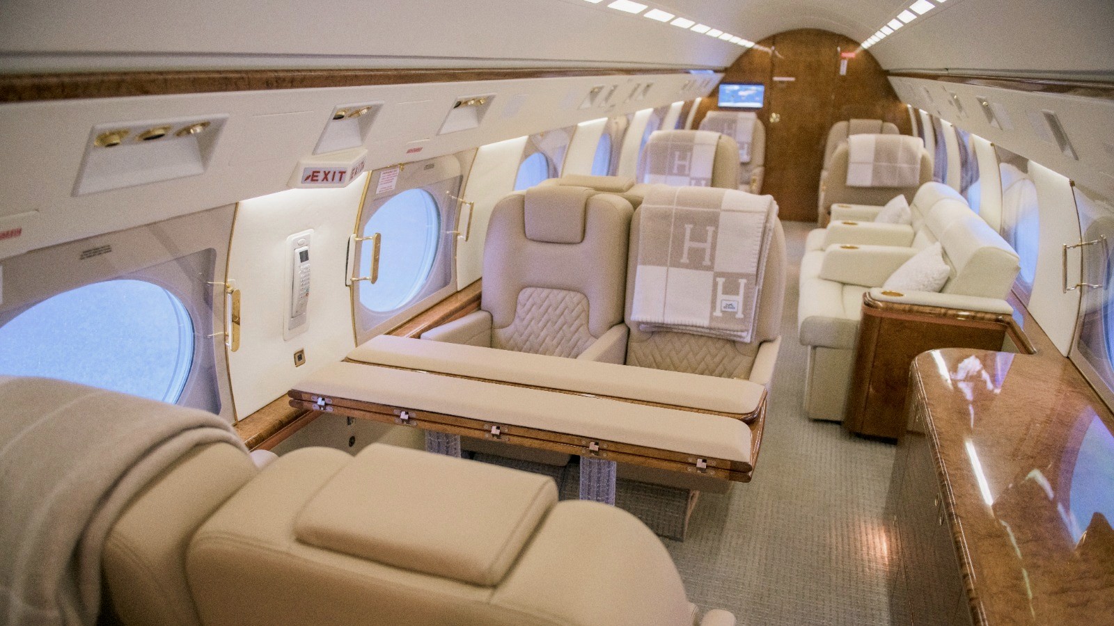 GIV-SP cabin, forward club seating with tables deployed