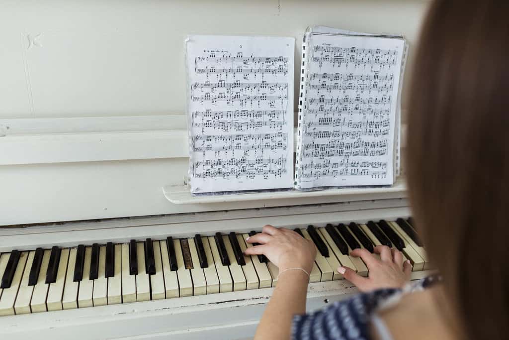 person with piano - What Are Dynamics in Music