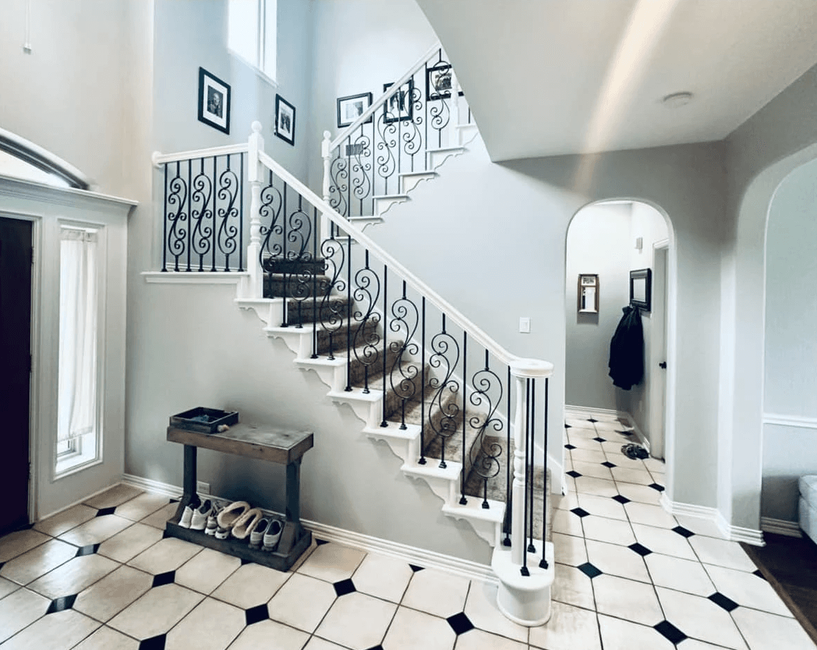 An updated house after a home renovation in Dallas, new stairs and a brand new lightening.