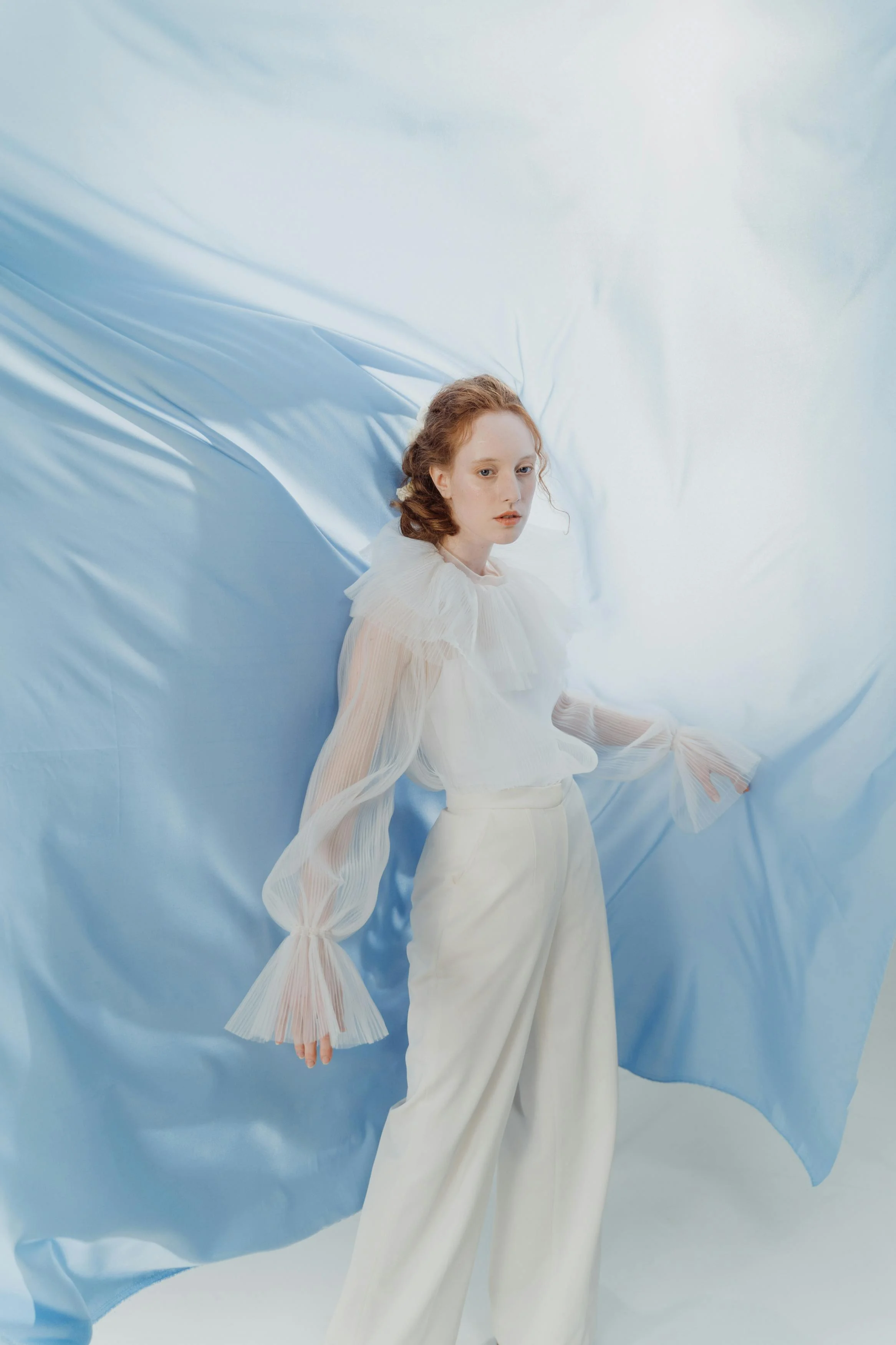 Soft Elegance: Studio Portraits in Light & Bloom