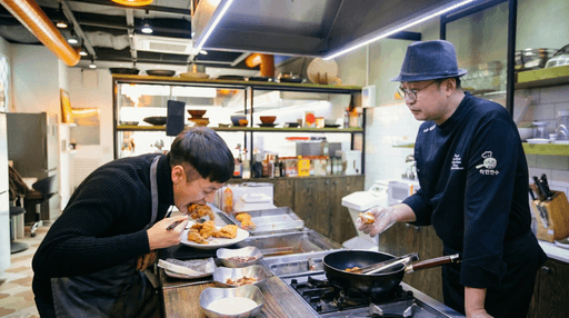 Close-up of lush, dark green leaves, some glossy and wet, against a muted background.