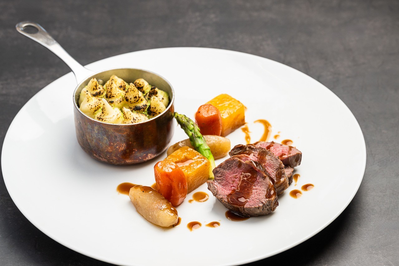 Elegant table service delivering a luxury dining experience
