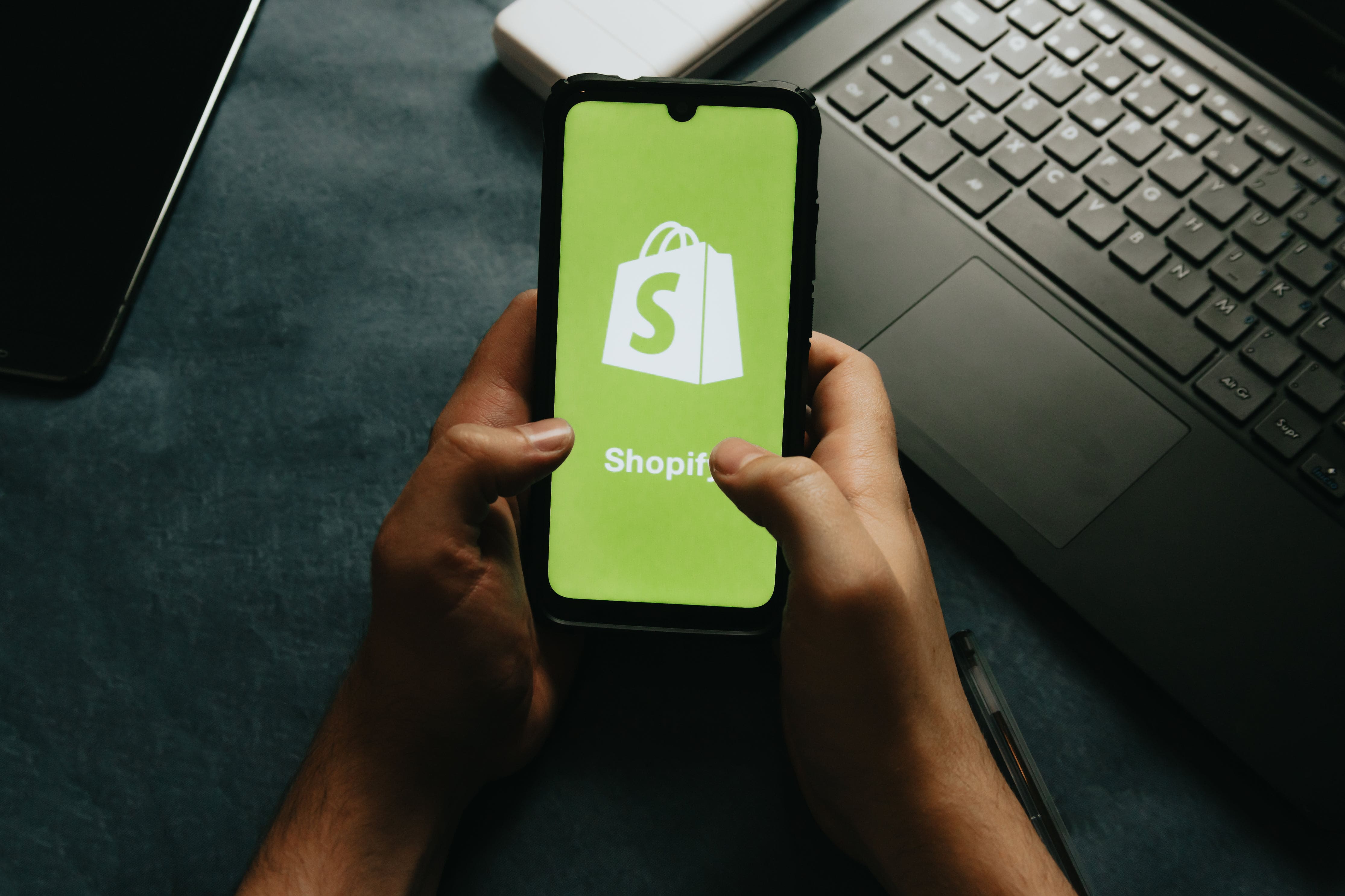Shopify logo on device