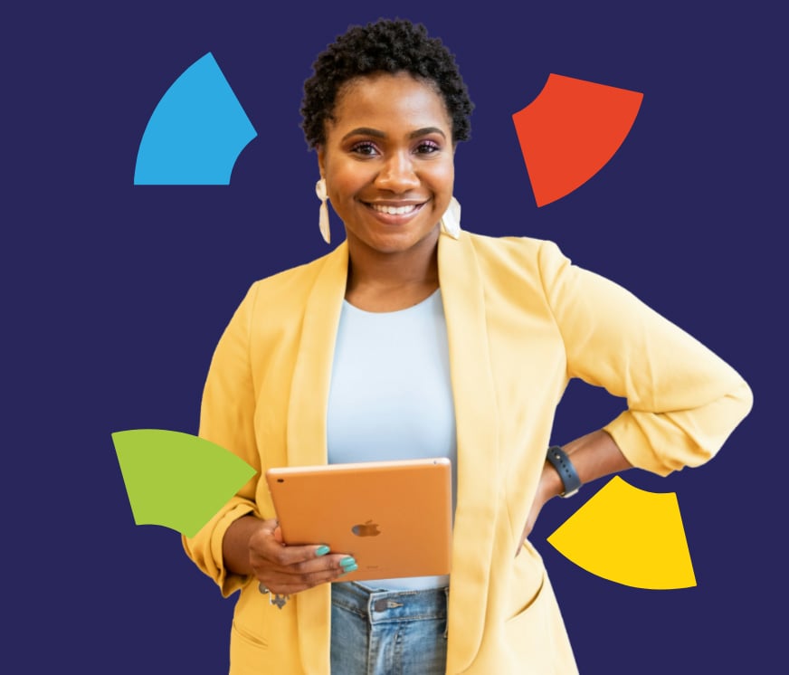 Person holding a small box with colorful decorations.