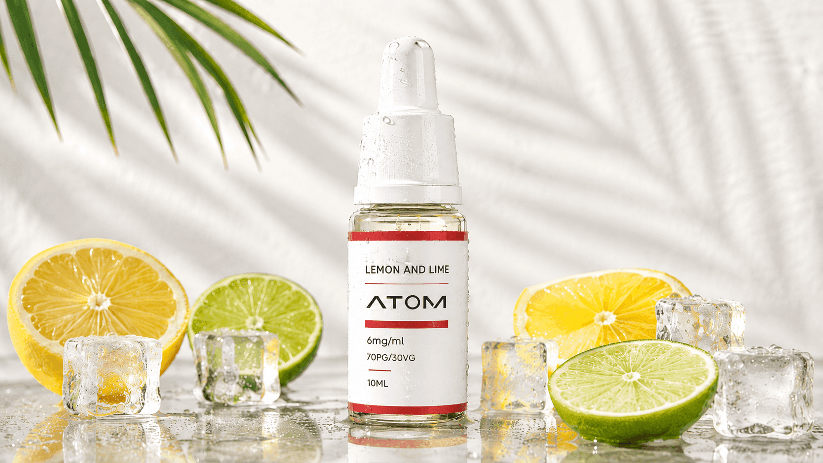 ATOM Lemon and Lime e-liquid bottle with fresh lemon, lime and ice cubes in a clean citrus product scene.