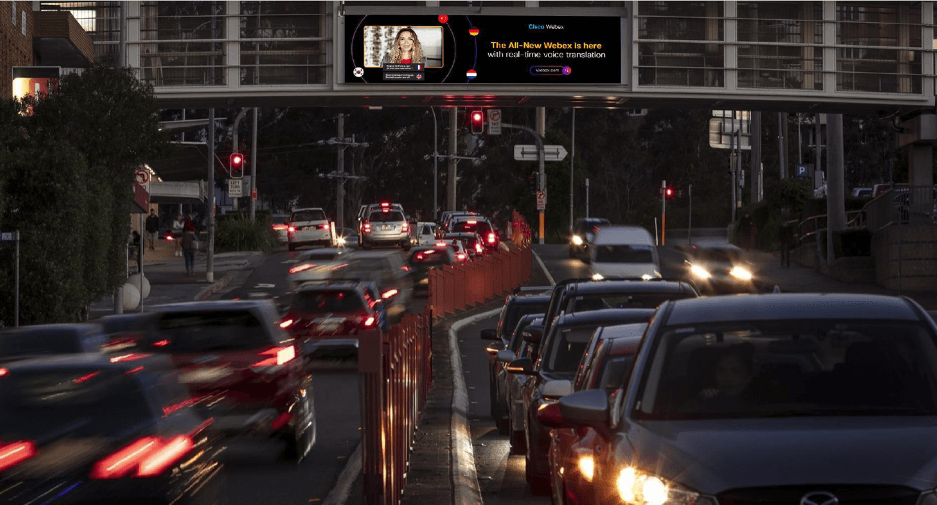 Cisco Webex screen over a busy road