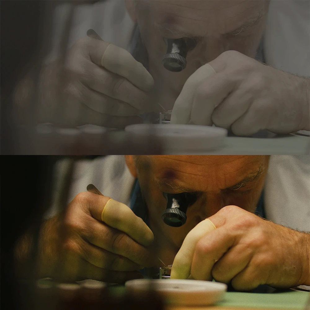 A watchmaker carefully at work with a loop in his eye and small tools in his hands