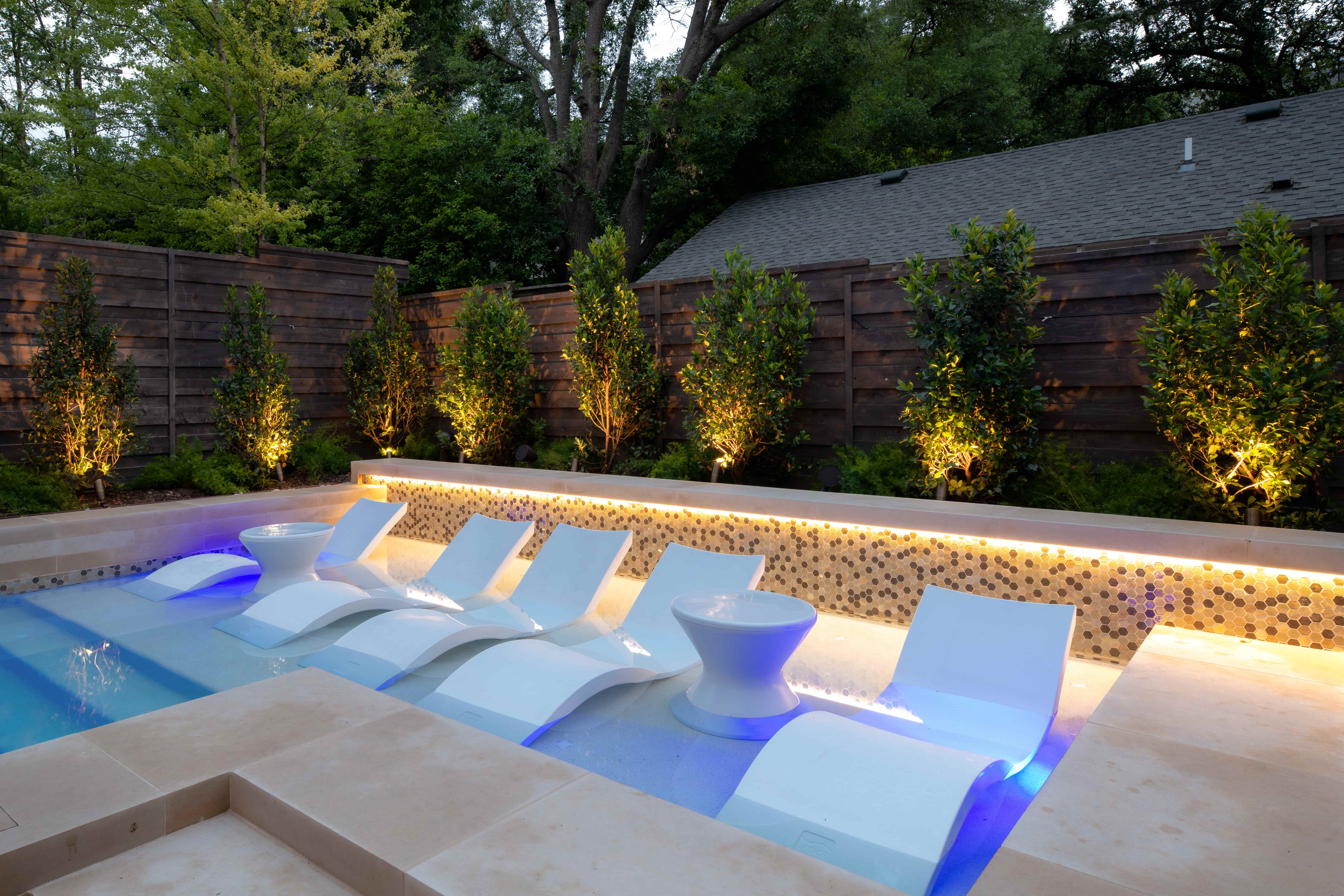 Luxury backyard and pool  design on a Highland Park TX estate by Blount Designs