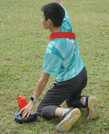 person writing on a piece of paper 