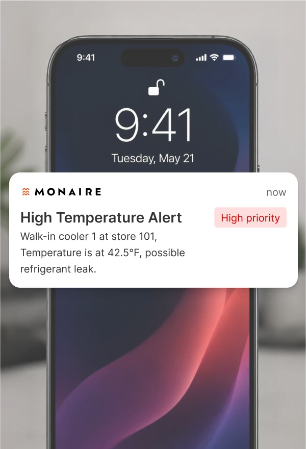 Mobile phone screenshot showing a high freezer temperature alert notification