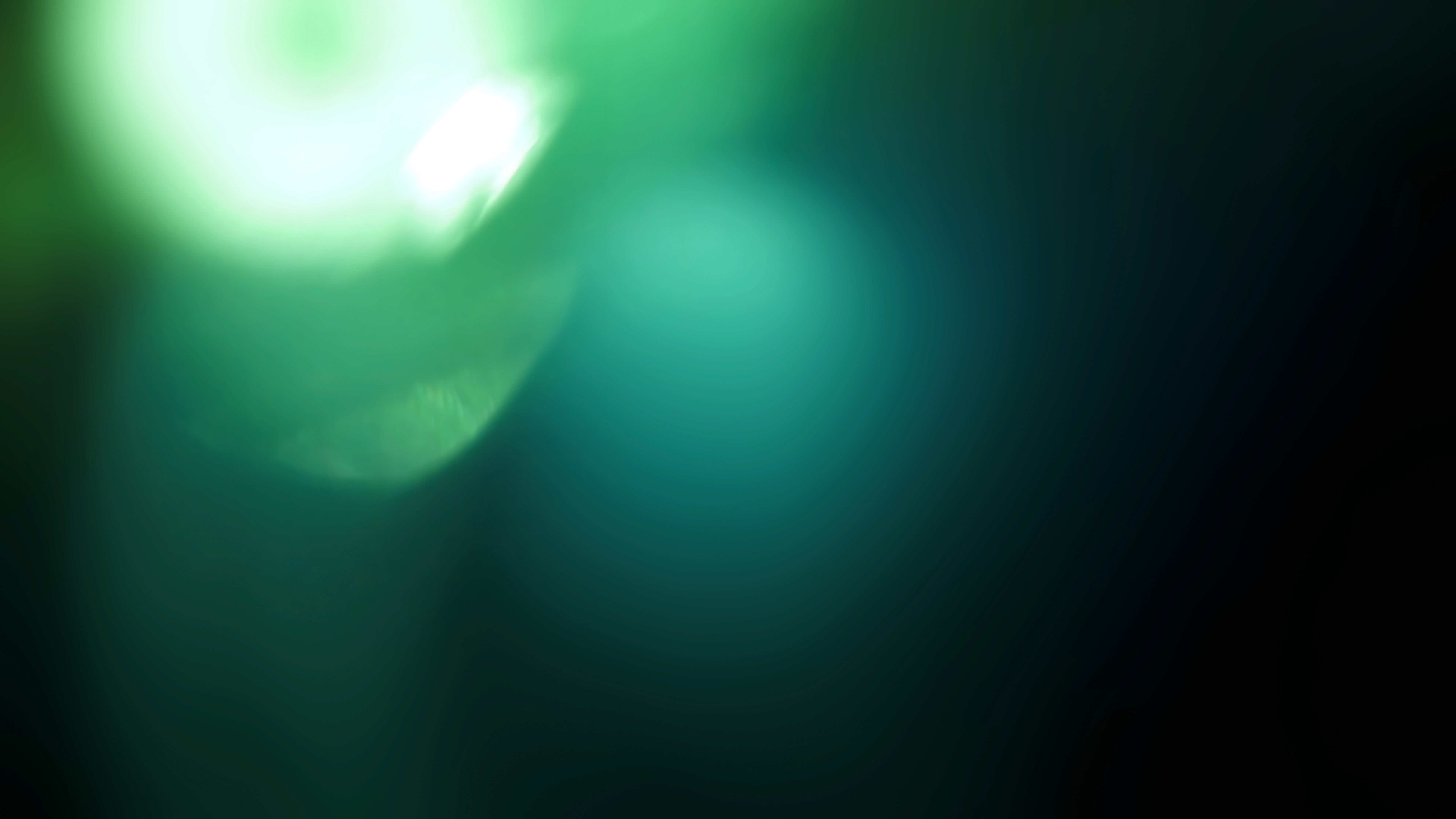 Green background with a light to dark gradient.