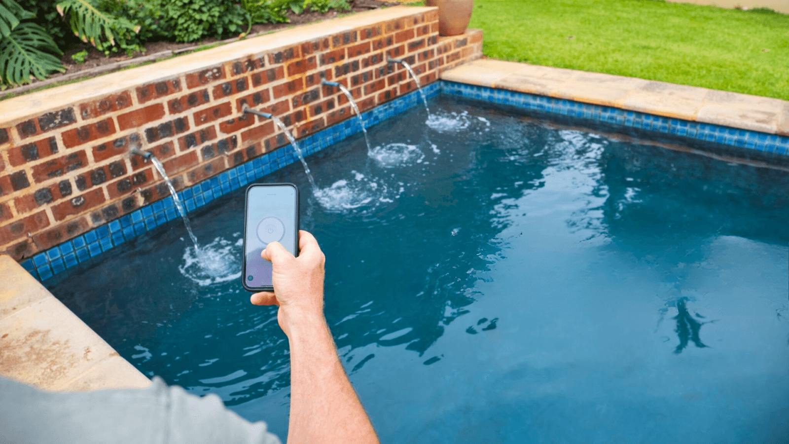 App-controlled smart pool system, managing temperature and cleaning schedules from a smartphone