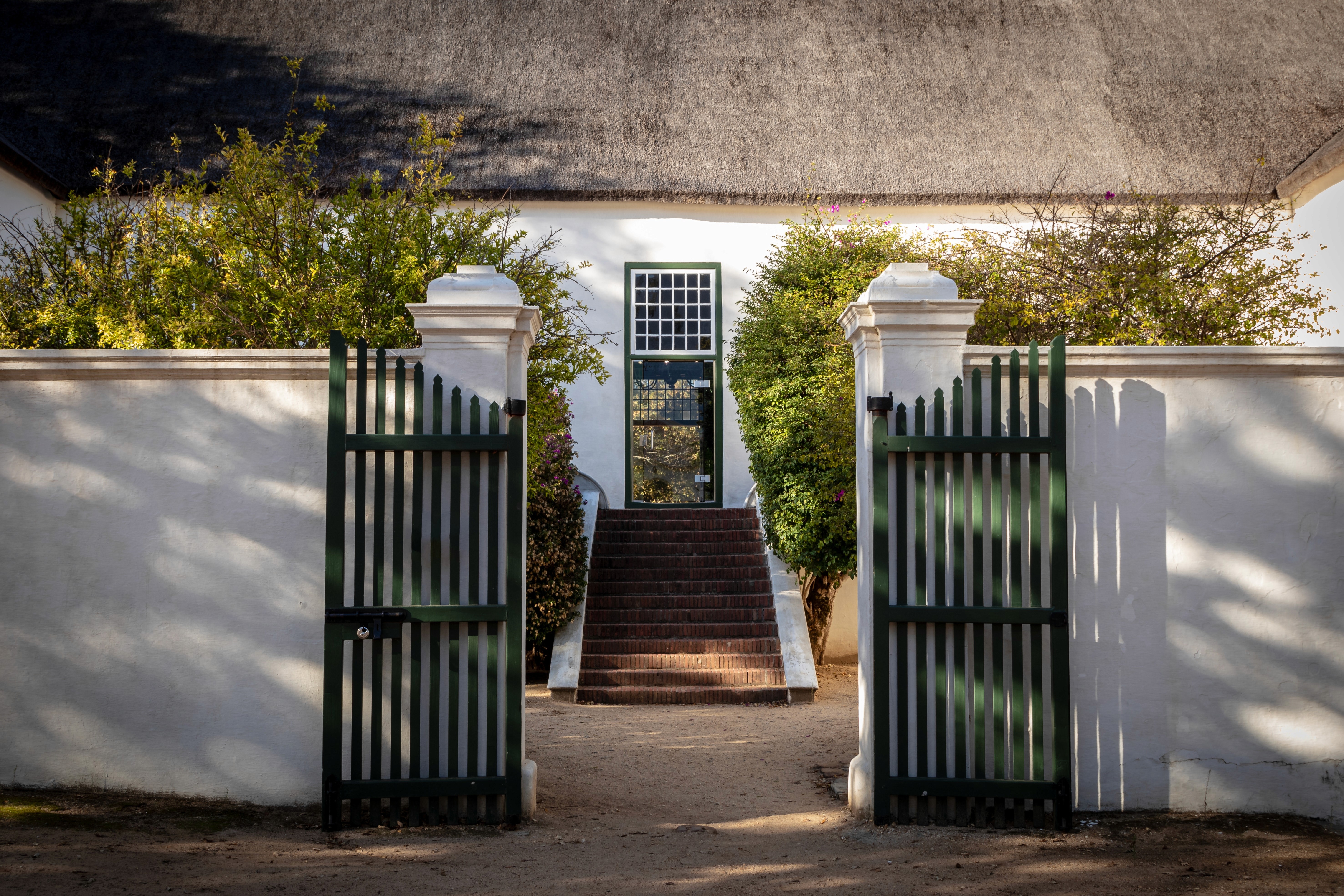 House with green gates 