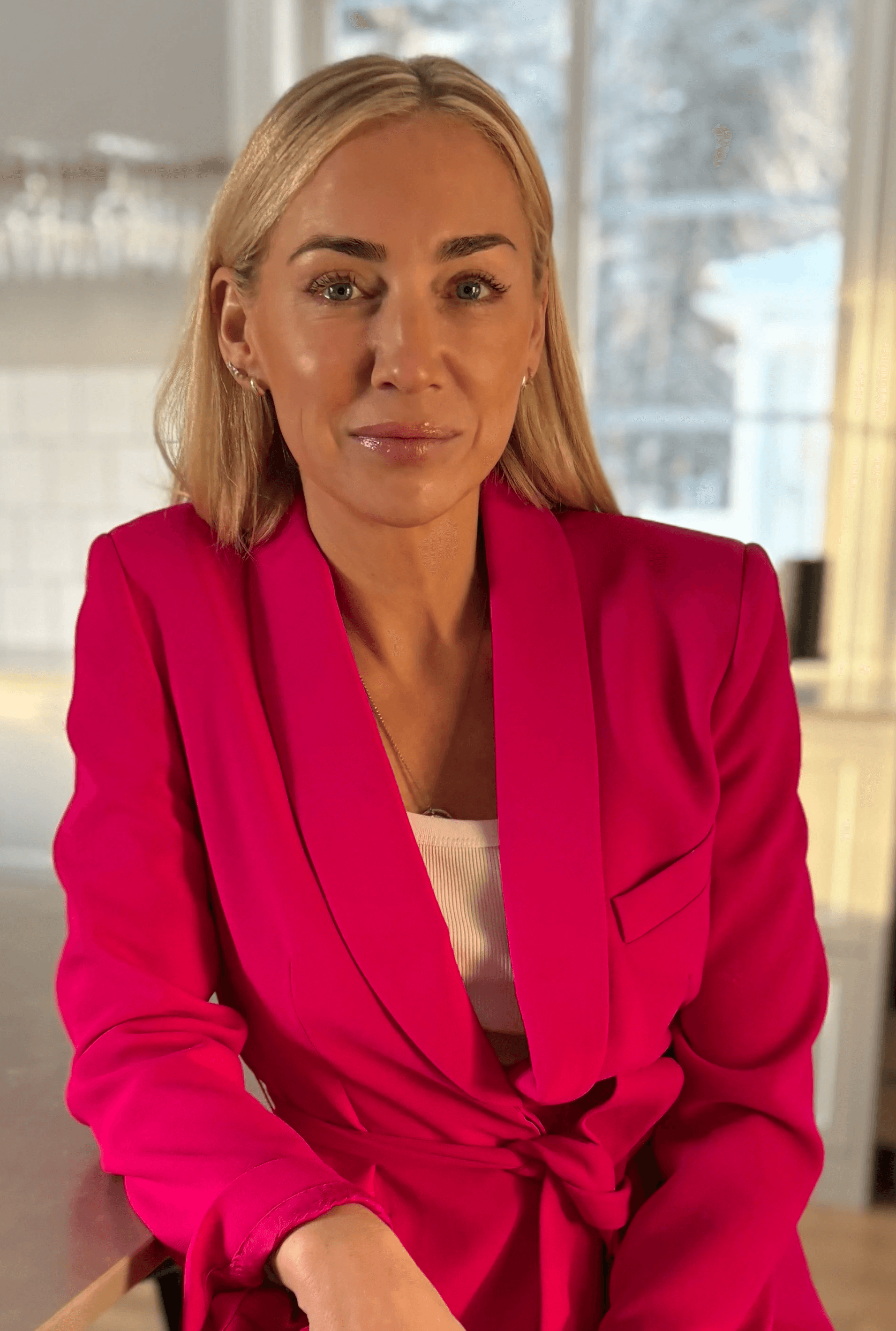 smiling girl in blue sleeveless dress