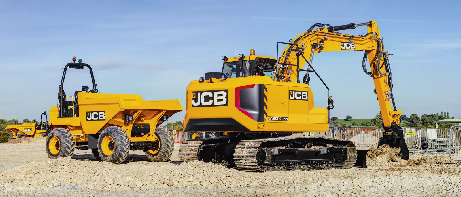 Yellow construction machinery on a prepared site
