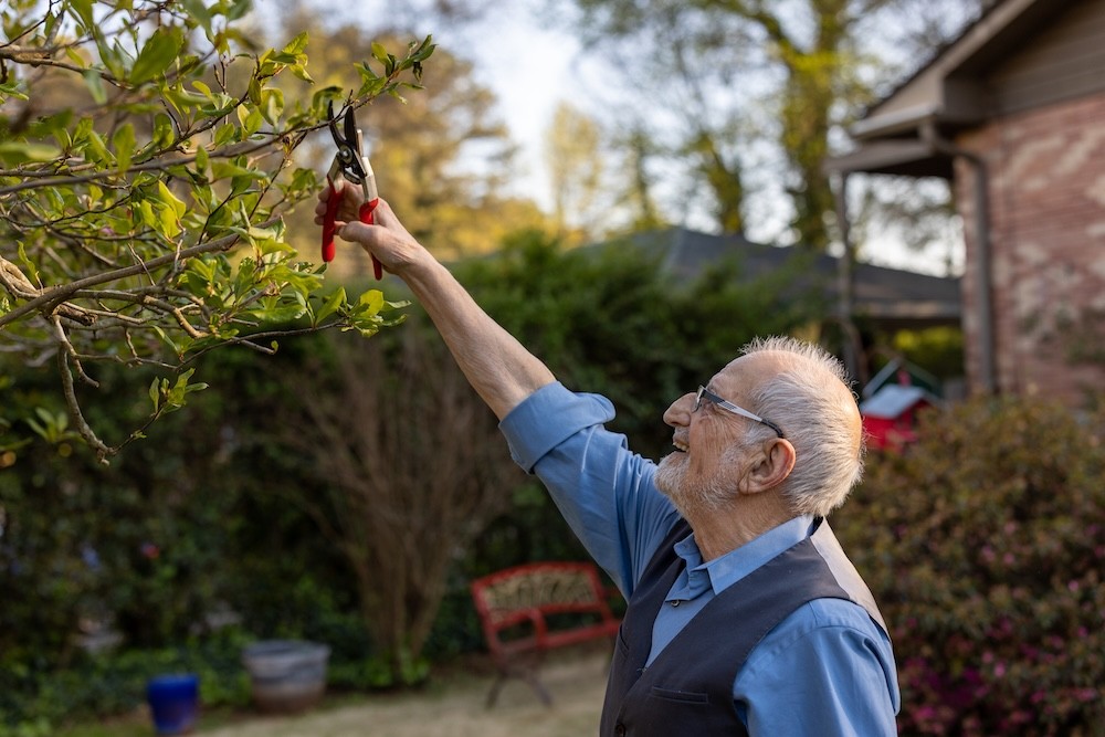 Bubjan with book and speaking to camera