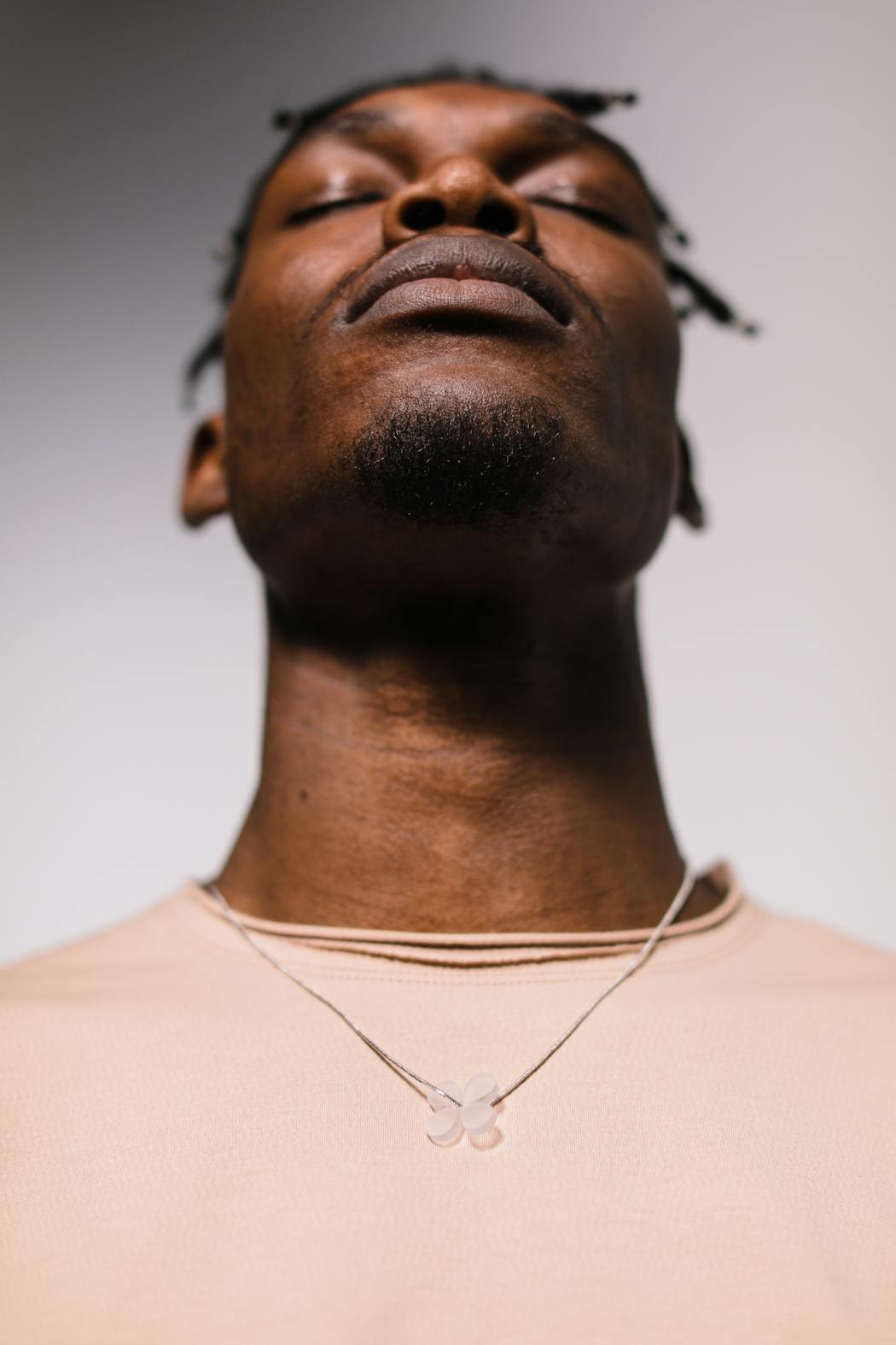 Portrait of a man wearing a cream crewneck