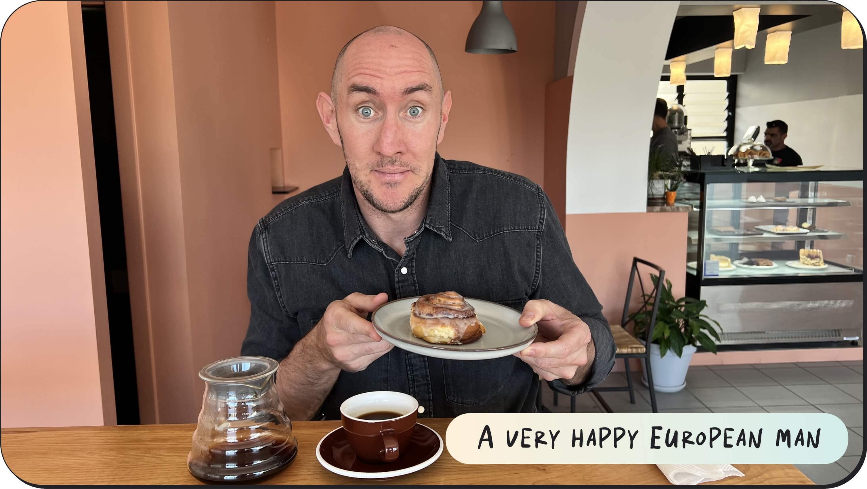 Jason enjoying cinnamon rolls and coffee