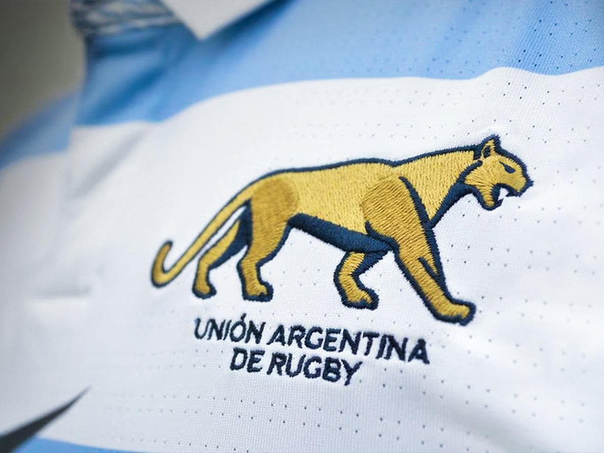 Rustic cabin in a golden field at sunset