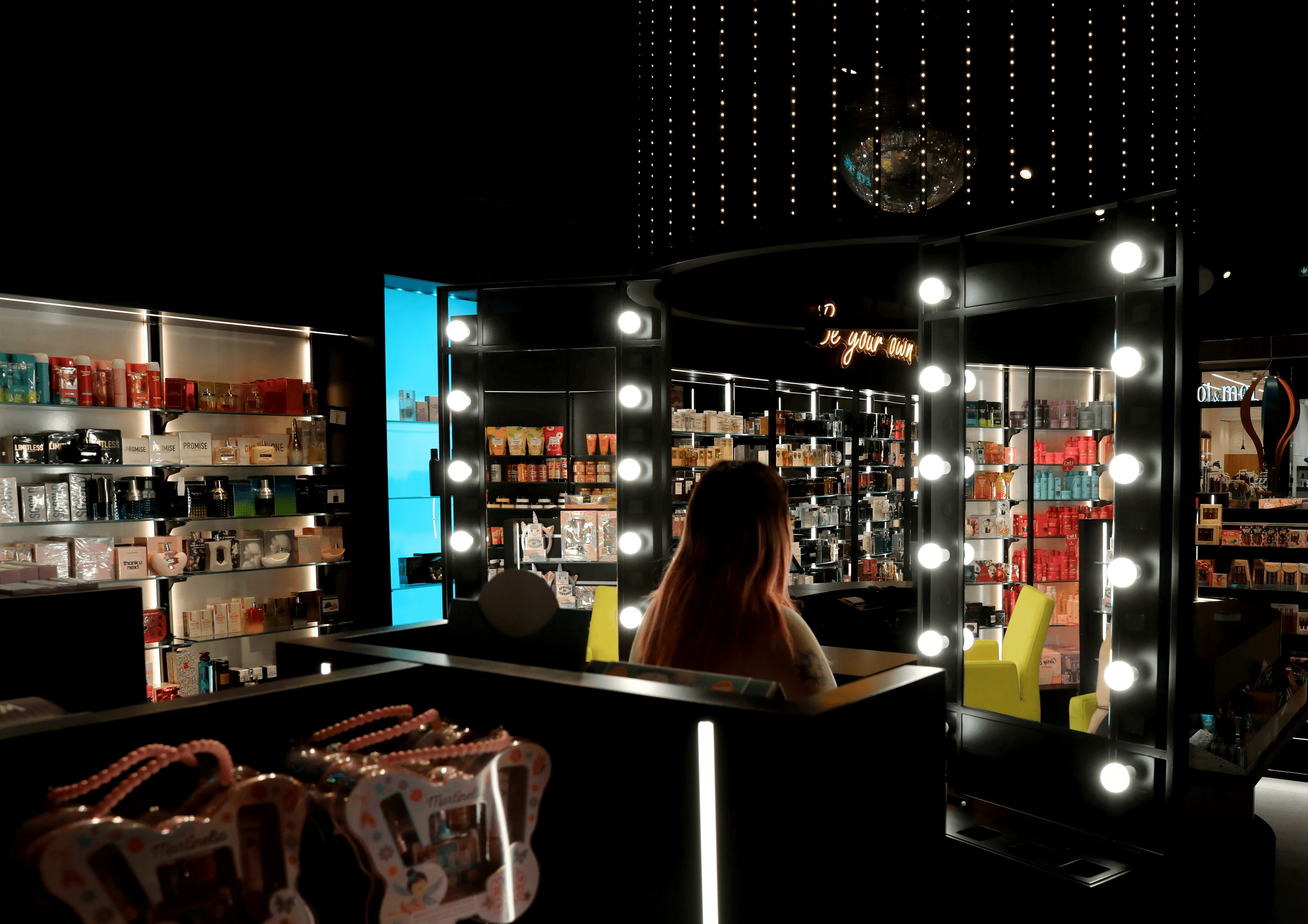 Hollywood vanity mirror makeup station inside Beauty Bar at Nicosia Mall — immersive retail interior design by topos Design Studio Cyprus