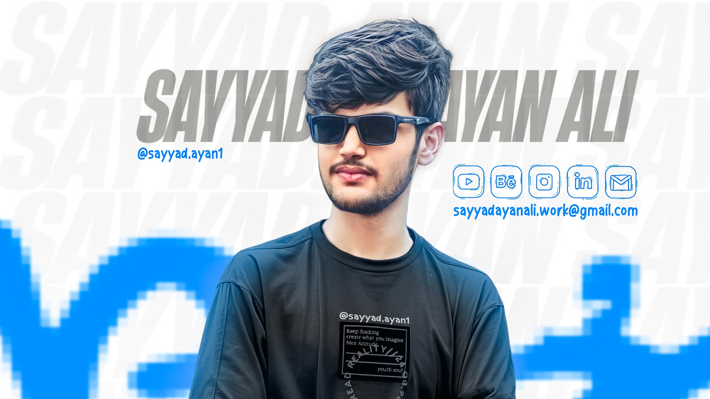 Man sitting in a dimly lit room, wearing a beige shirt and looking contemplative.