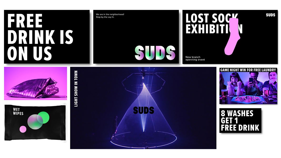 The image is a collage of six distinct posters with black backgrounds and white text. The top left poster reads “FREE DRINK IS ON US.” The top middle poster says “We are in the neighborhood. Stop by the say hi.” The top right poster says “LOST SOCK EXHIBITION.” In the bottom left, there is a black poster with a silver metallic bag and a pink and purple circle. The bottom middle poster says “LIGHT SHOW IN TOWN.” The bottom right poster shows a group of people at a table with a “GAME NIGHT WIN FOR FREE LAUNDRY” sign. Below that, a black poster displays “8 WASHES GET 1 FREE DRINK.”