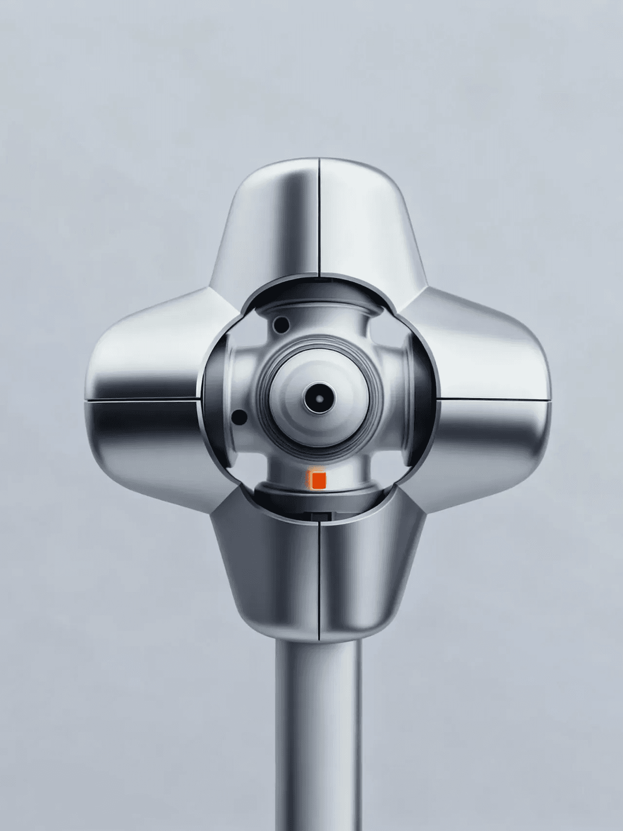 Close up of metallic industrial component with central circular opening