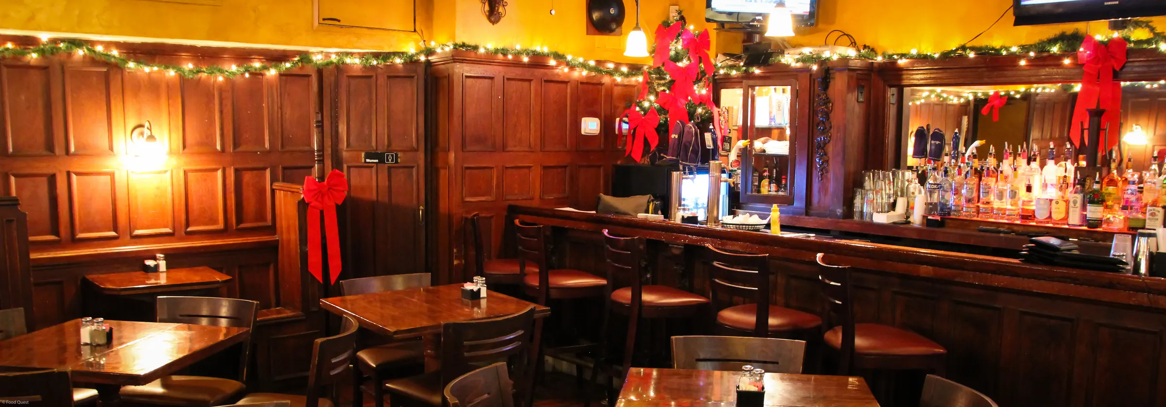 Wood-paneled dining room and bar at Ringside Café