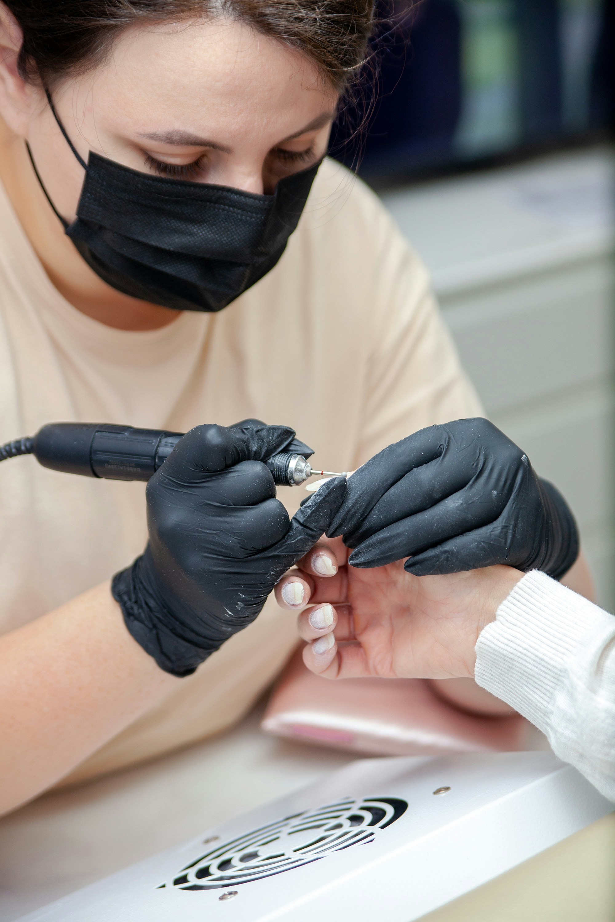 a person using a microscope