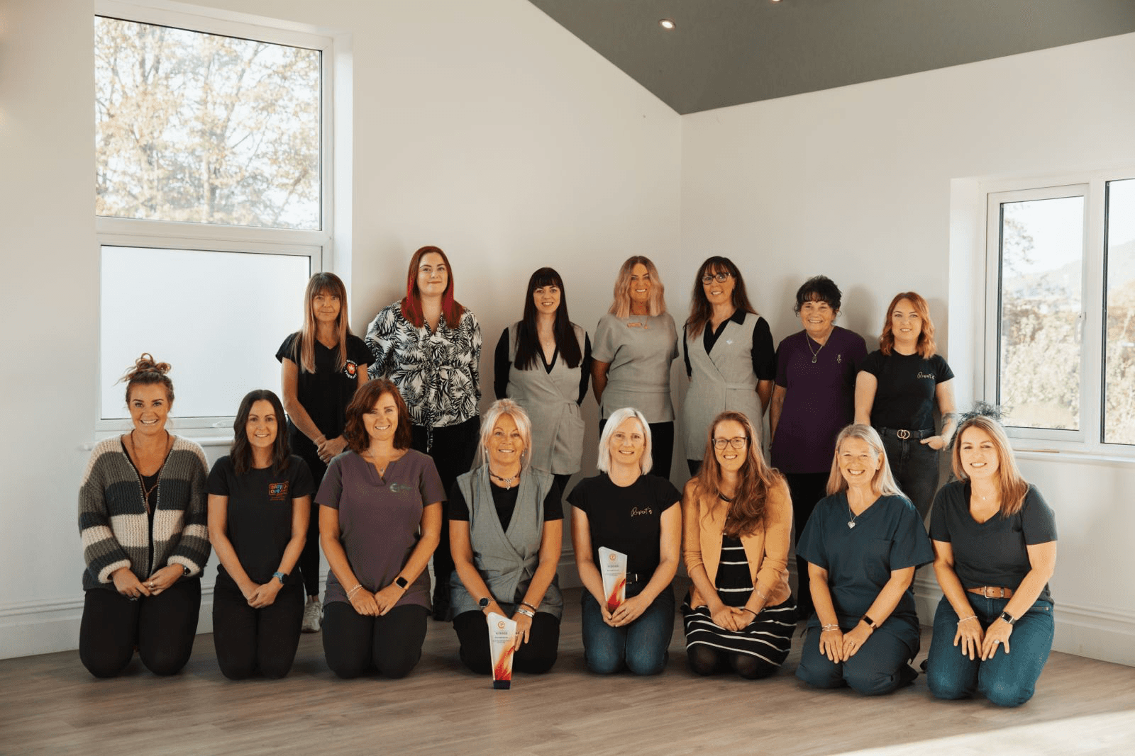 a man sitting on a motorcycle in a parking garage