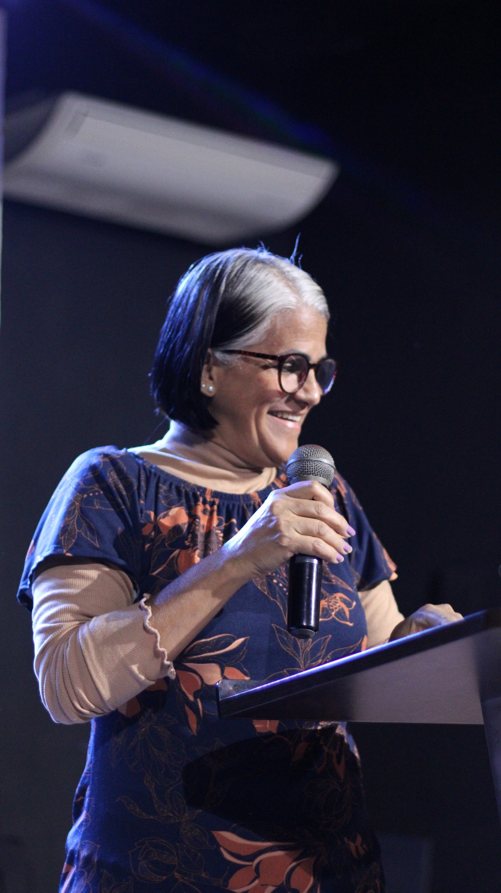 body of water under cloudy sky