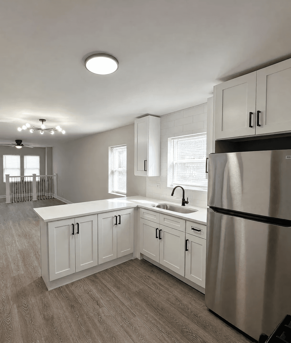 Clean empty room with gleaming hardwood floors after Simple Scrub move-in move-out cleaning