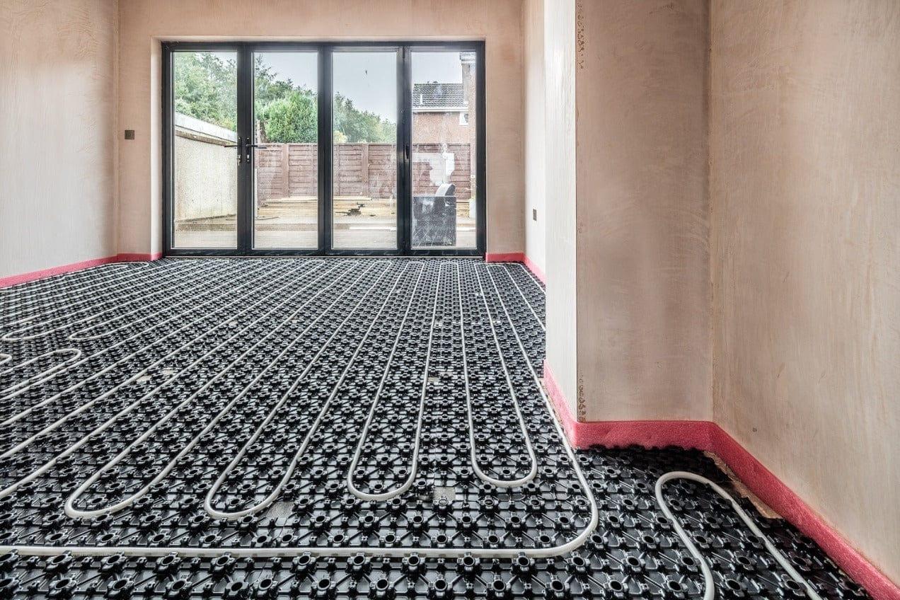 Underfloor heating manifold with zone actuators in a UK new build property where a wiring fault prevented one zone from activating