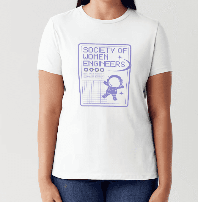 A mockup of a shirt on a person reading Society of Women Engineers.