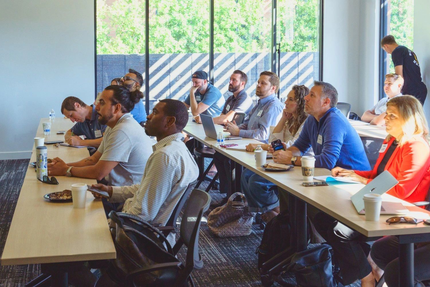 a black and white living room with a large tv