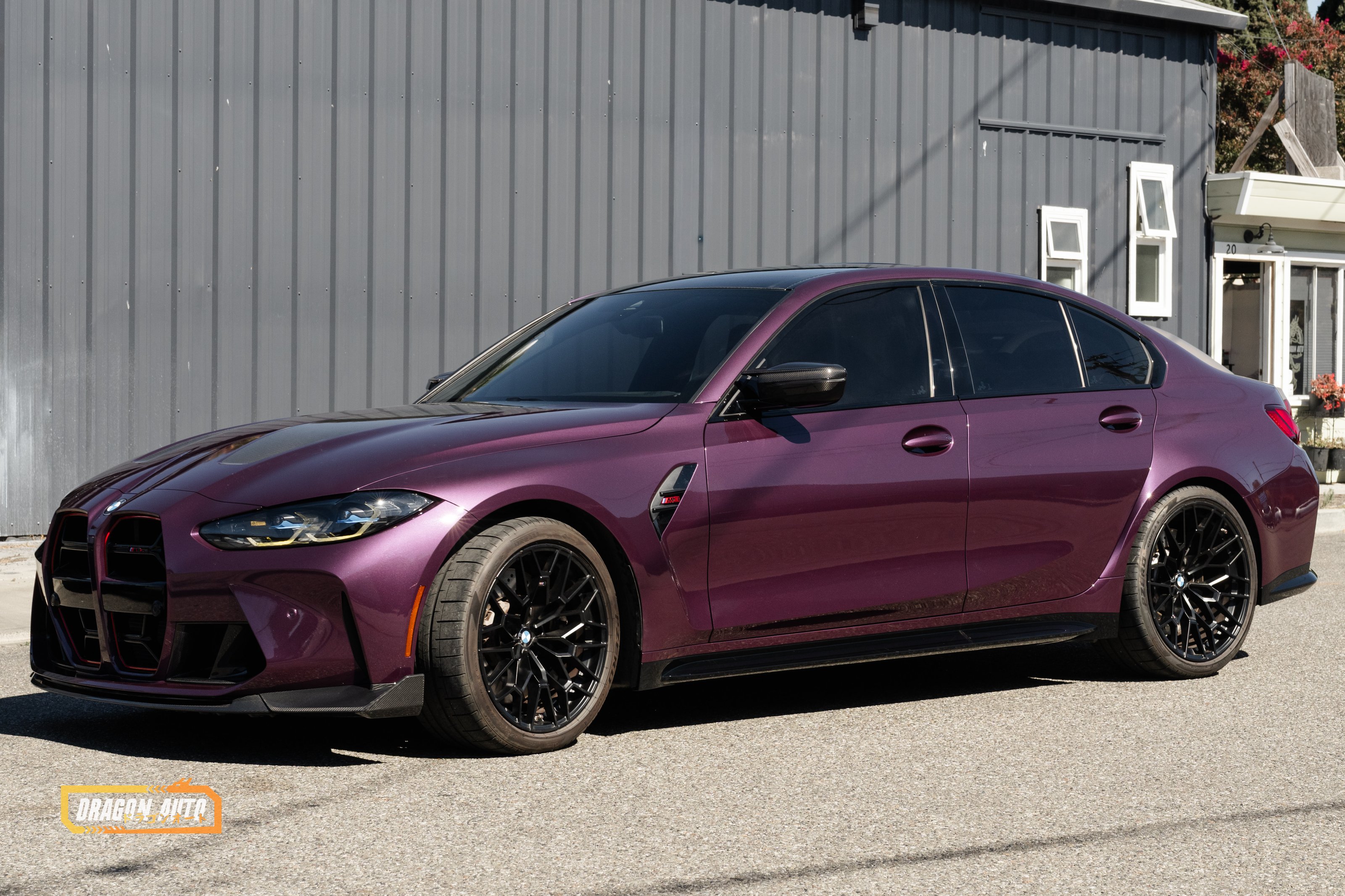 Purple 2024 BMW M3 CS with PeelClear color change, front three quarter view in daylight, Dragon Auto Milpitas
