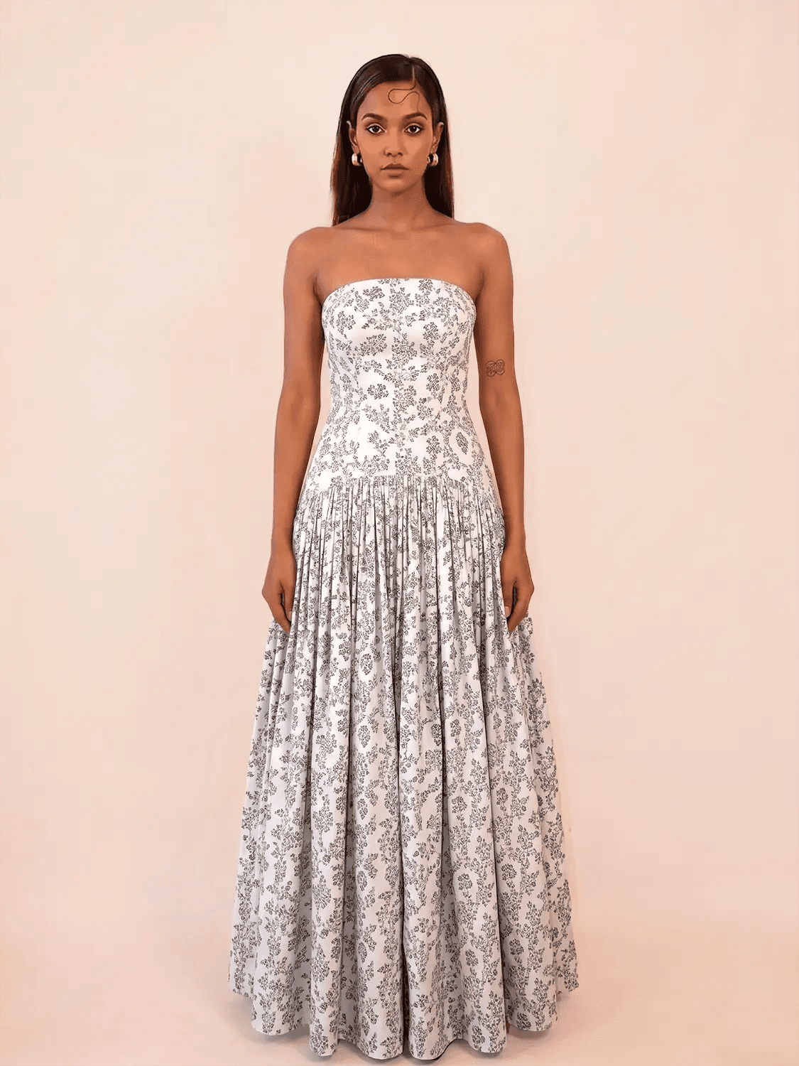 NOOR I is our one-of-a-kind printed silk drop-waist dress, handcrafted by skilled artisans in-house using a one-of-a-kind vintage silk saree.