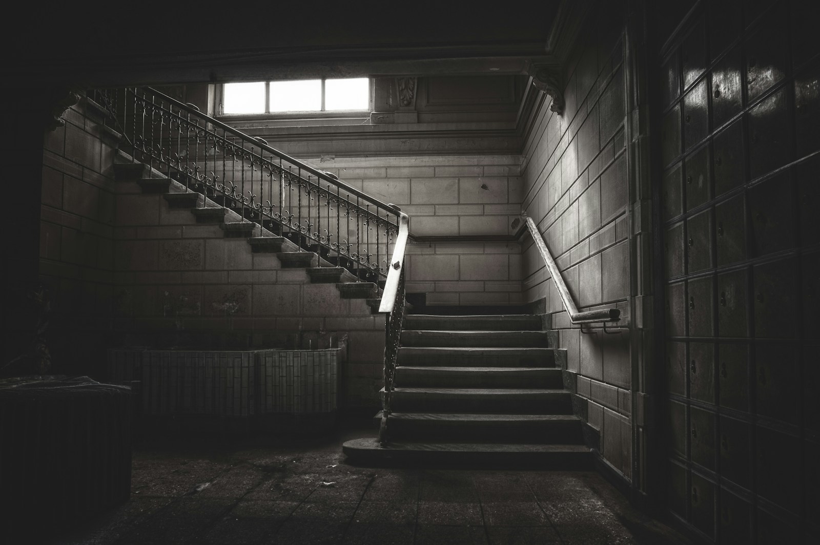 Derelict stairwell in an abandoned school before restoration