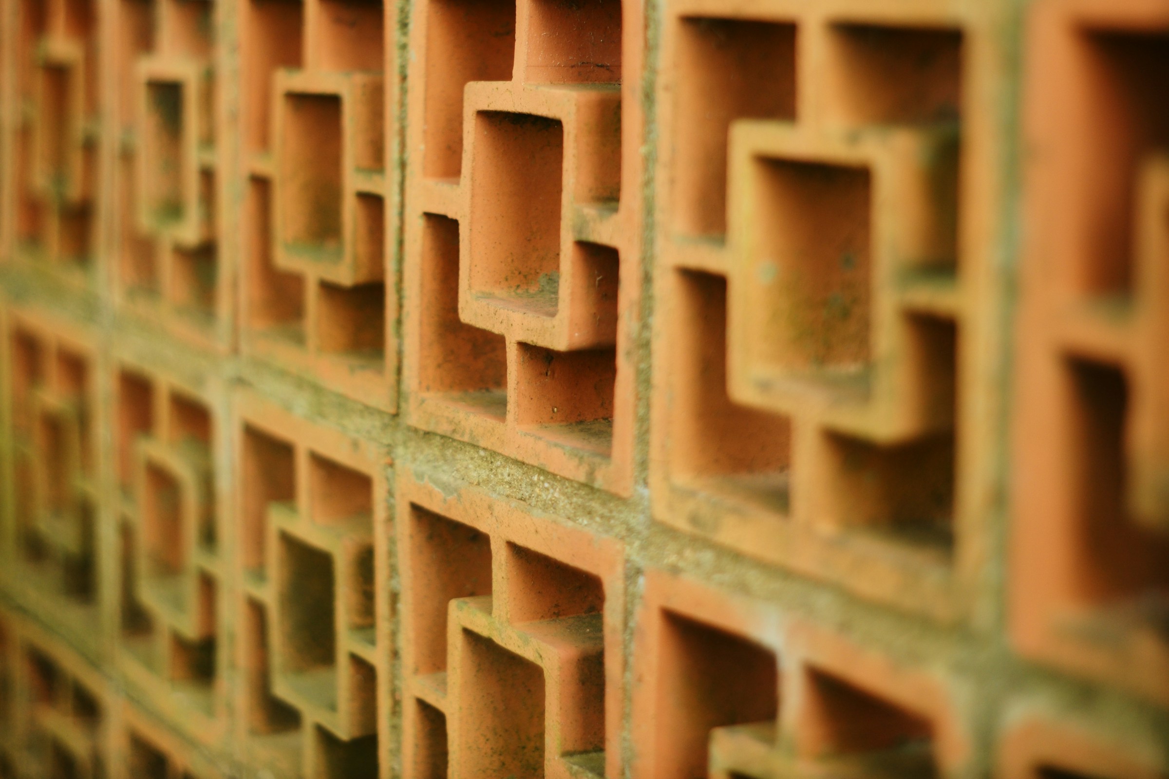 Terracotta geometric patterned wall with square openings