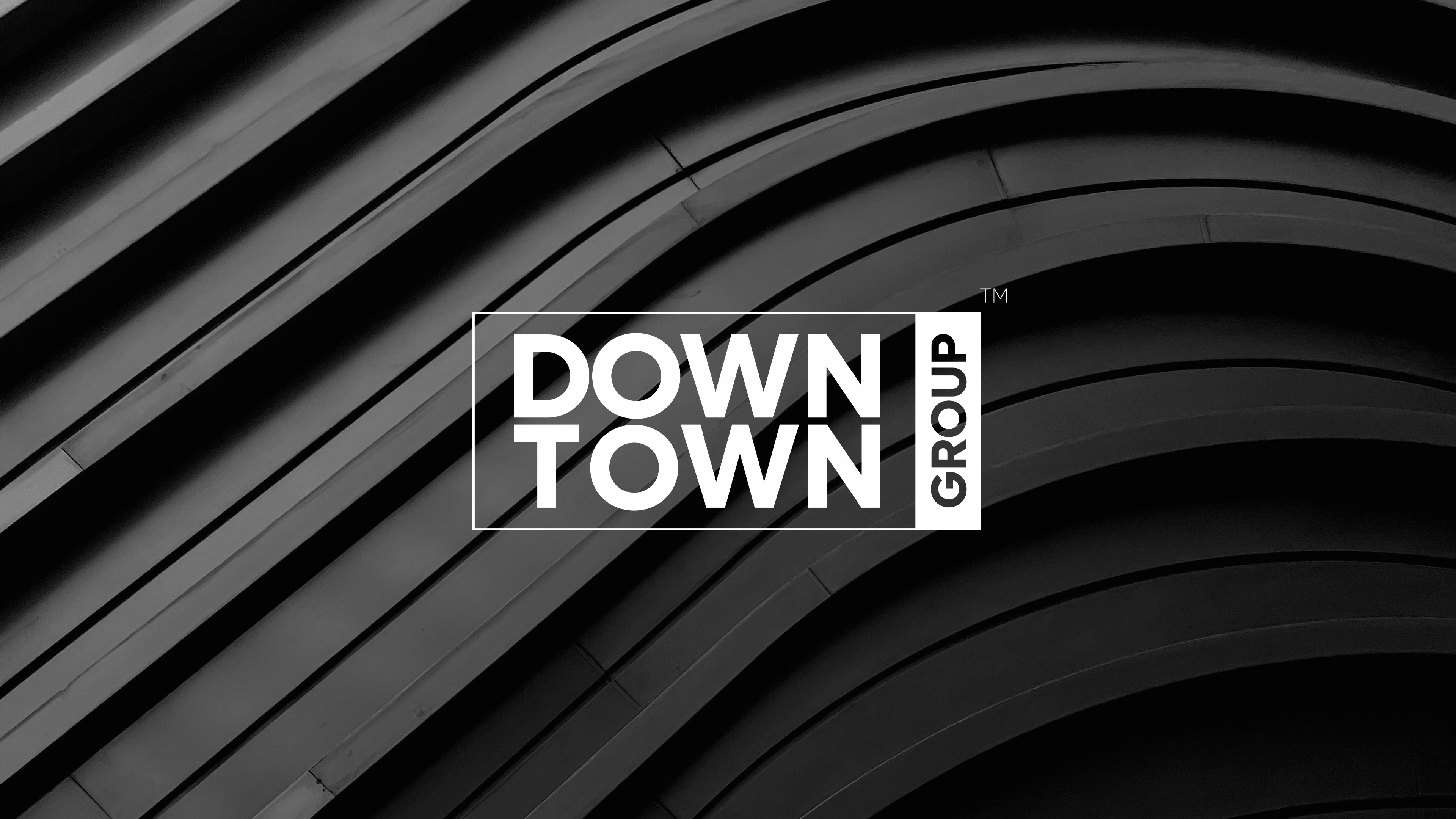 Downtown Group brand refresh — real estate services company branding by Elevate Studio